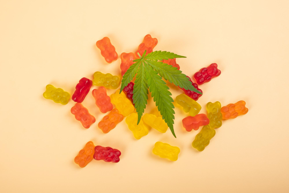 thc jelly candies cannabis sweets drugs green leaf yellow background Understanding The Effects of CBD Gummies